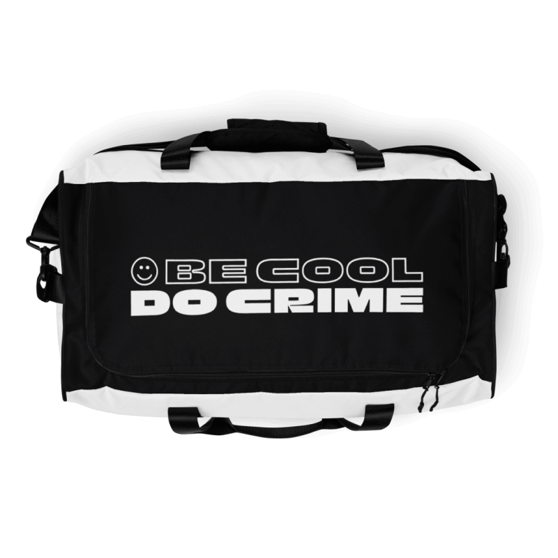 Black and white sports bag with a smiley and the words 'be cool do crime' printed on it's top in white capital letters, the smiley and the first two words are outlines, while the last two words are filled