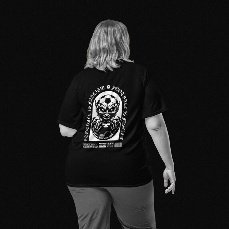 Woman turning her back to the camera, wearing a black sports jersey with white print, it has the words 'Football is Fascism' printed on it's back, along with an illustration of an evil creature, evolving out of a football. Below there are several arbitrary icons.