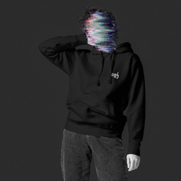 Woman wearing a jeans and a black hoodie with the Hebrew phrase 'L'Chaim' embroidered on it's chest in white yarn, her face is made unrecognisable through colourful glitches